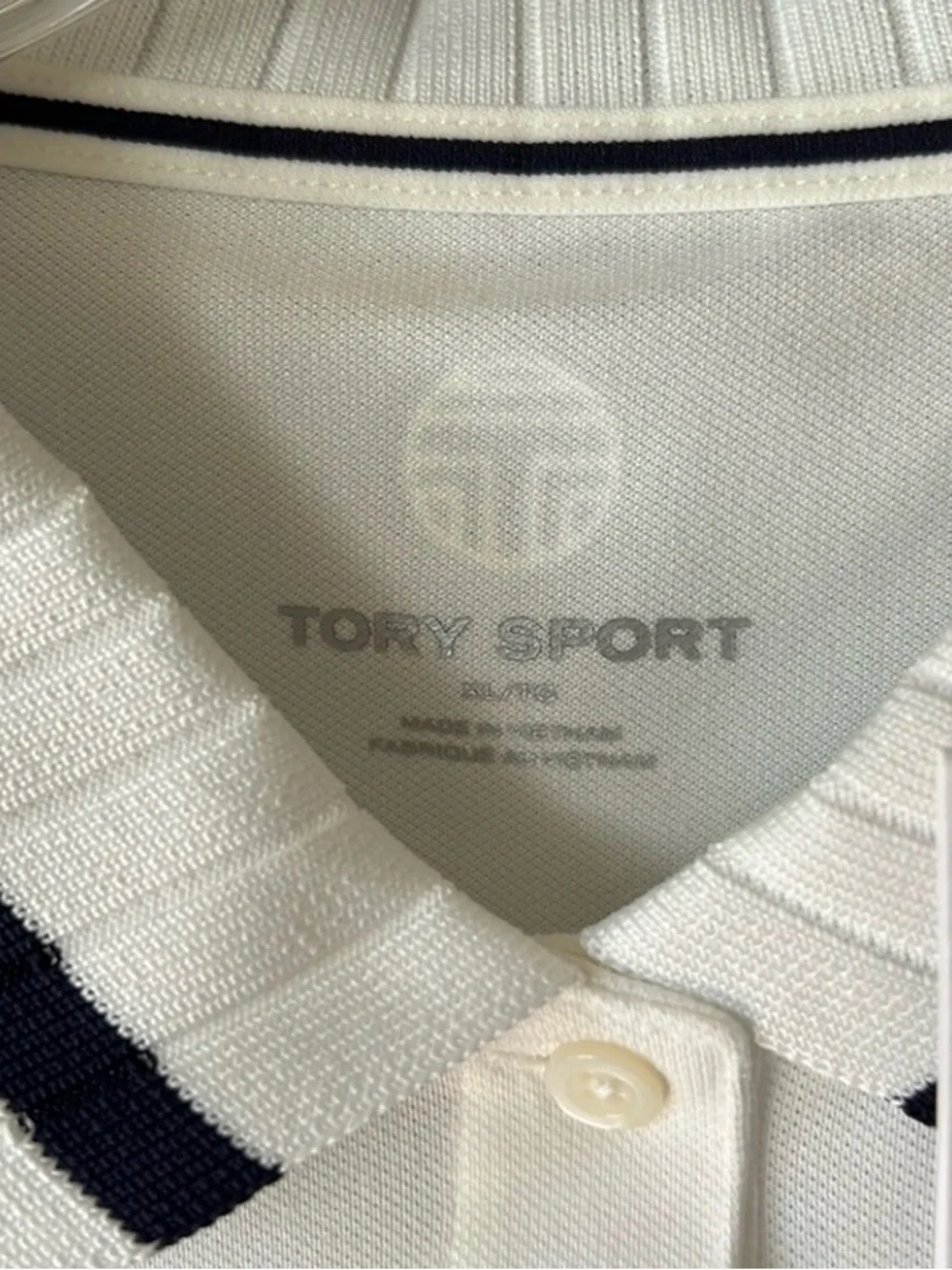 Tory Burch reposhing this